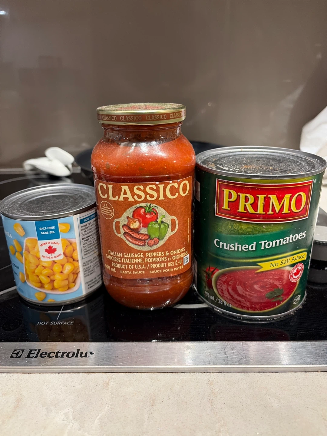 MUST GO APRIL 1: corn, crushed tomatoes, pasta sauce