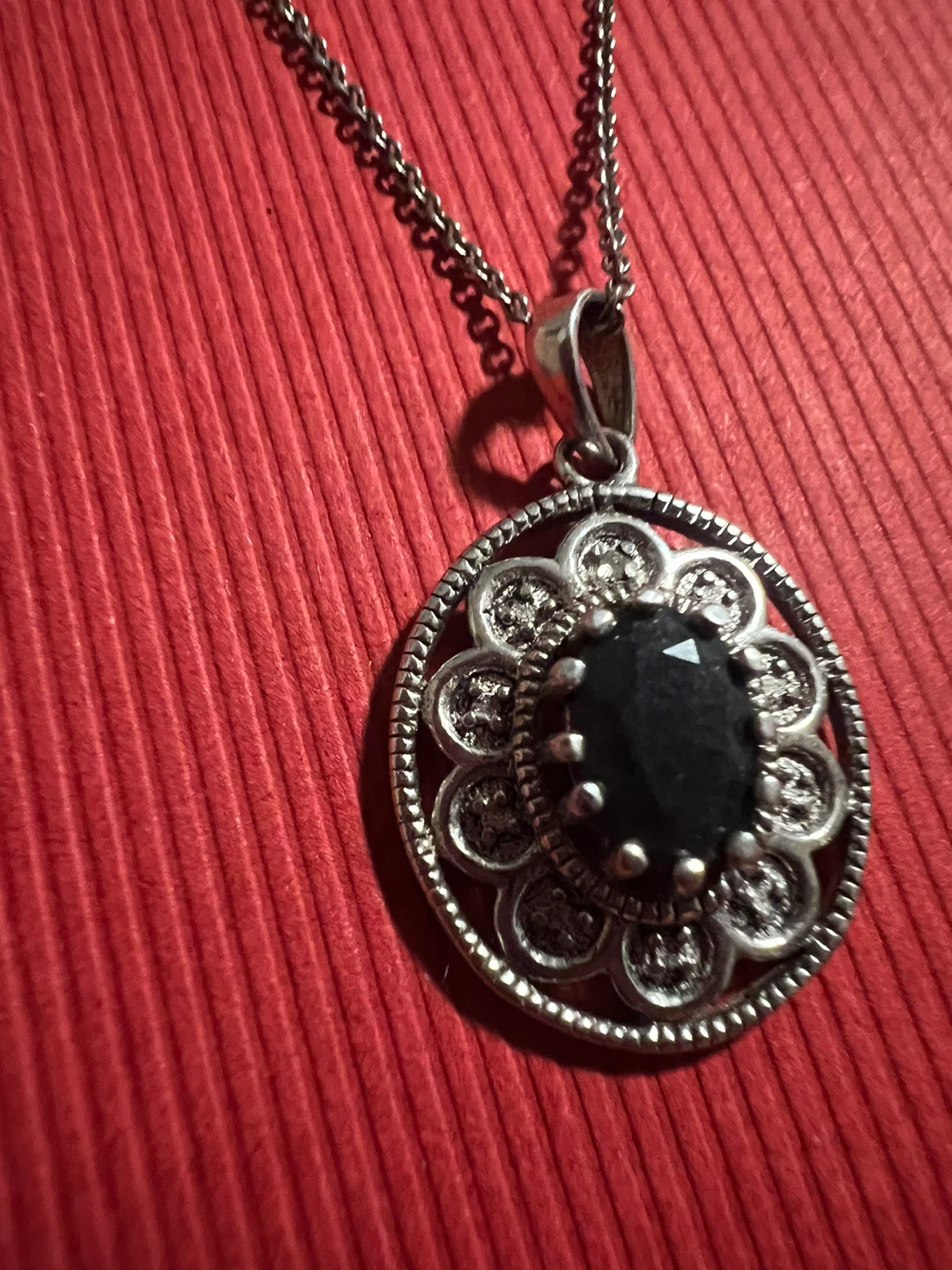 925 Silver and sapphire, 3 diamonds.