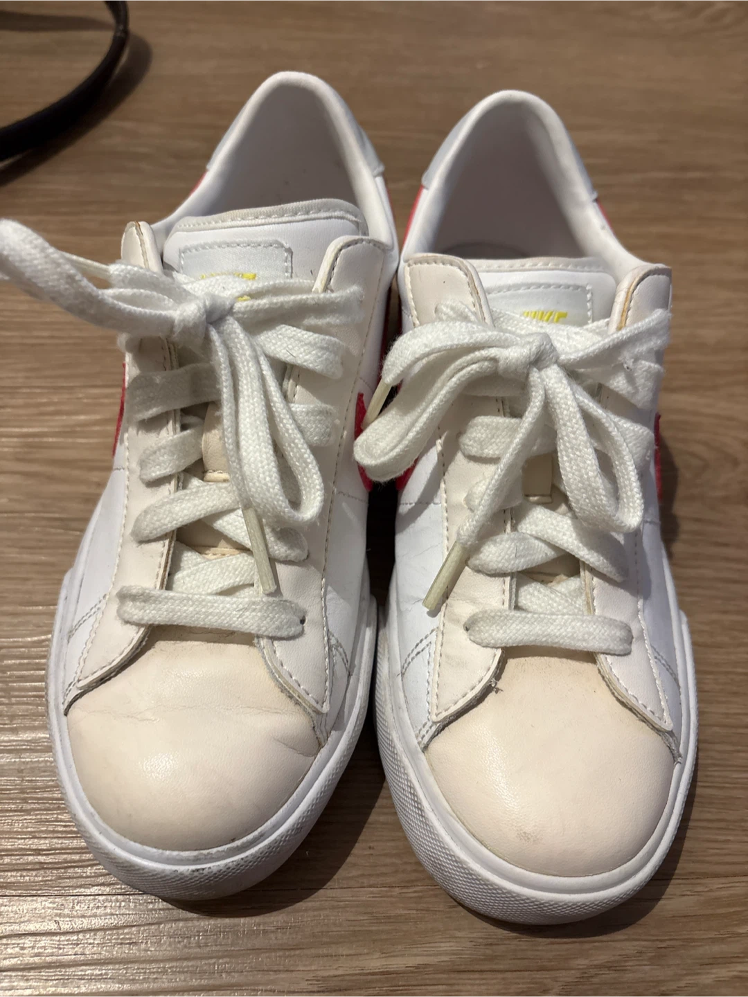 Nike White Tennis Shoes with Red Swoosh