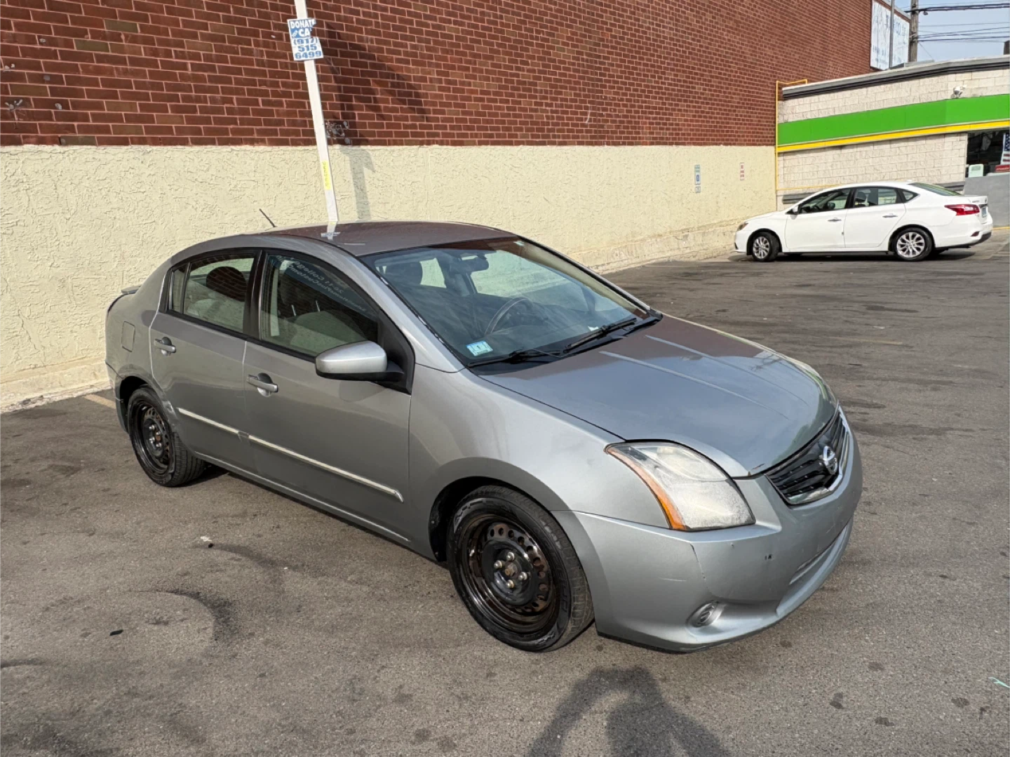 Silver Nissan Sentra 2011 Sedan - photo 2