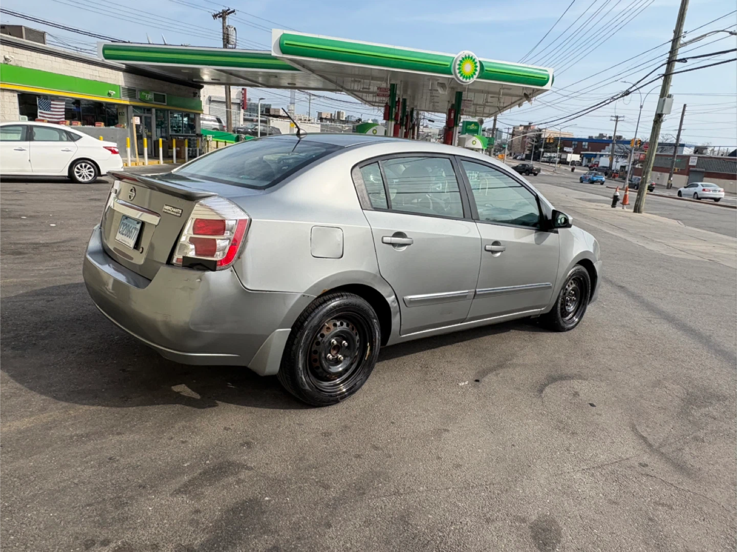 Silver Nissan Sentra 2011 Sedan - photo 5