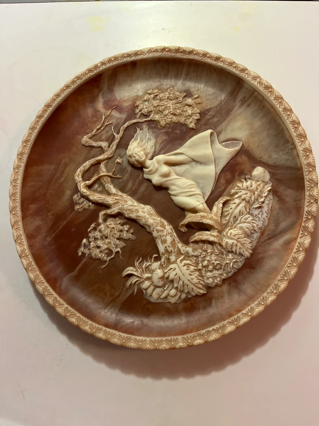 Decorative relief plaque