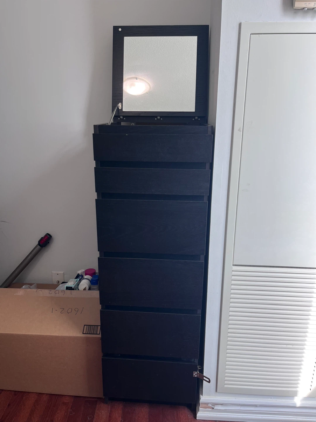 Black dresser with mirror