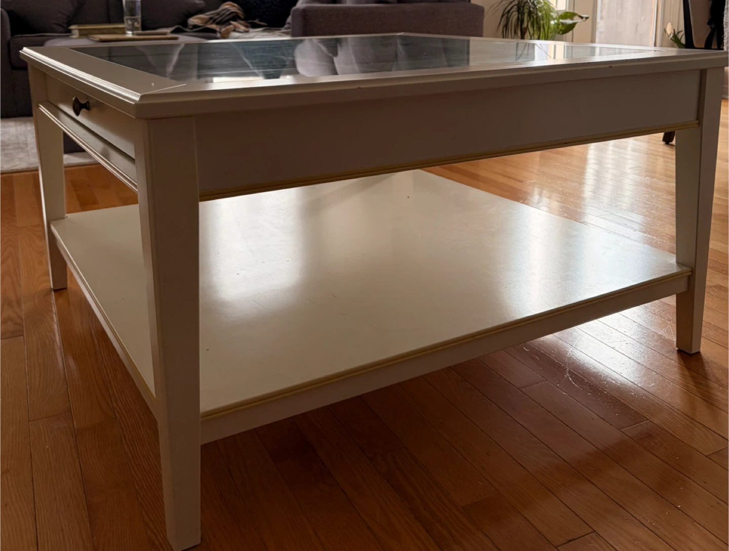 White IKEA coffee table with glass top and storage drawers - photo 3