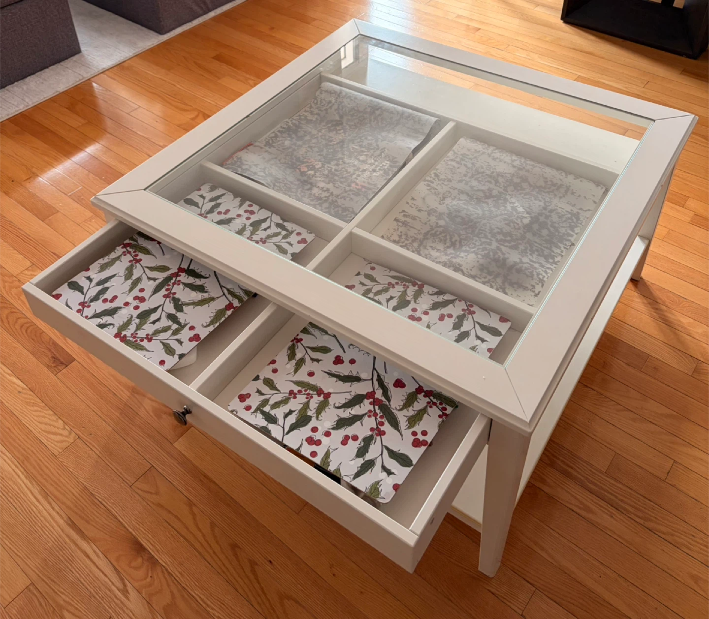 White IKEA coffee table with glass top and storage drawers - photo 2
