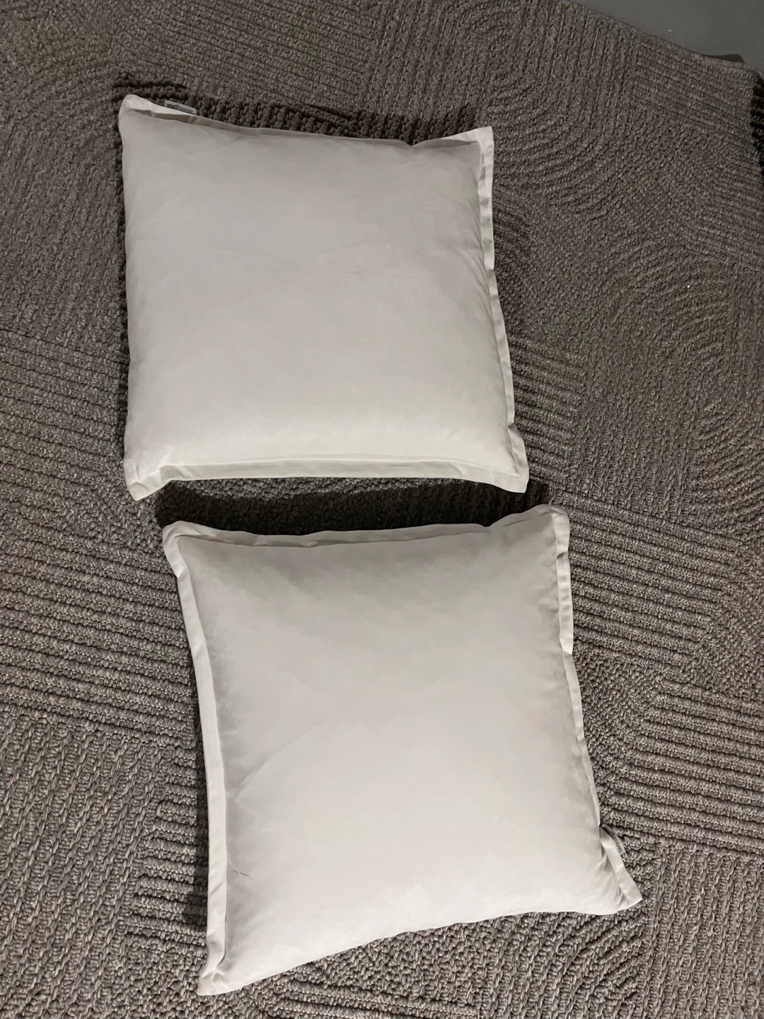 Two White Throw Pillows