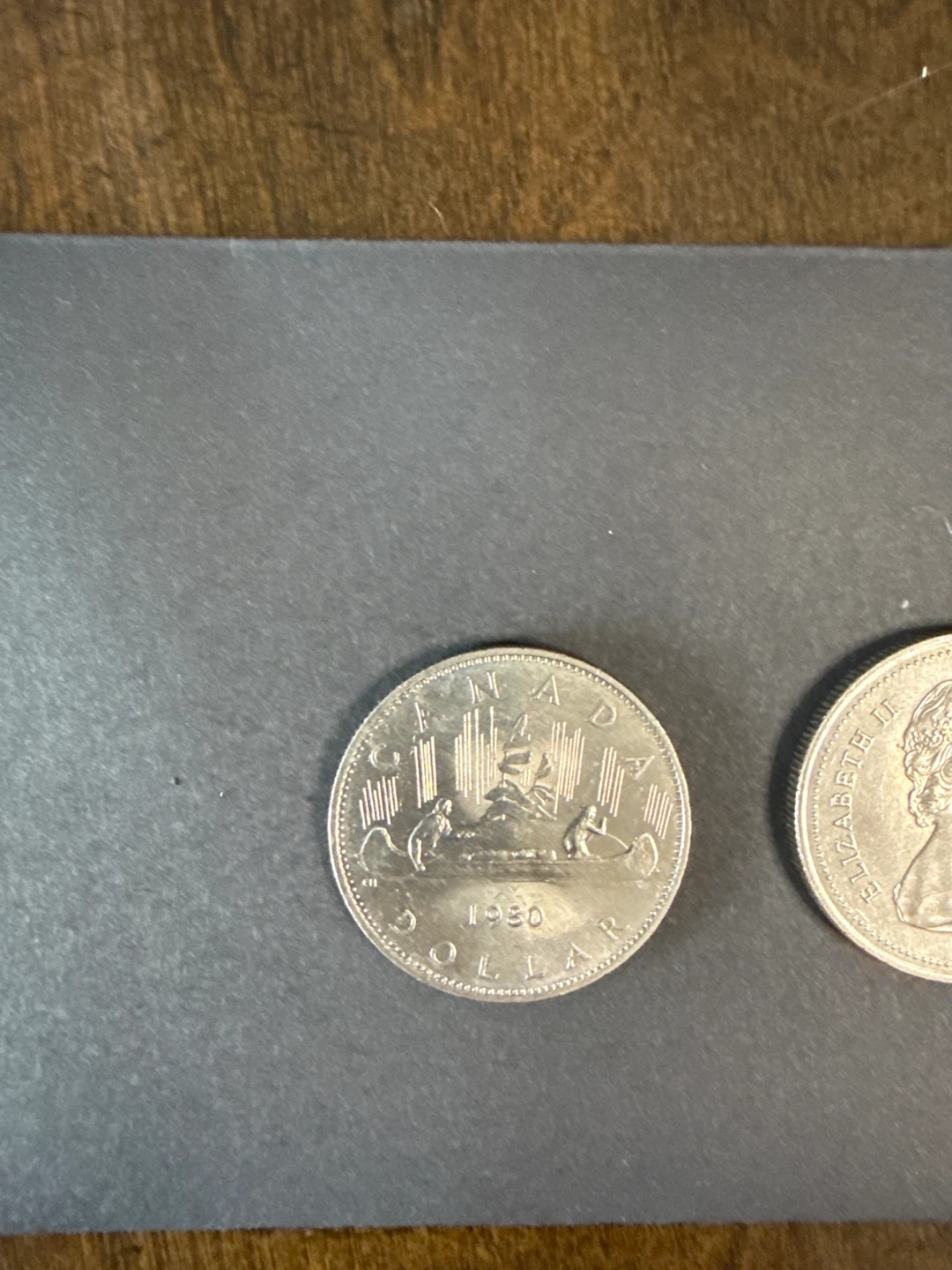 Two 1980 Canadian Dollar Coins - photo 4