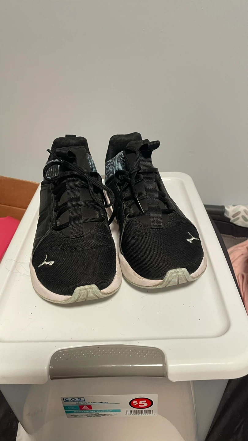 A Nike and puma women shoes