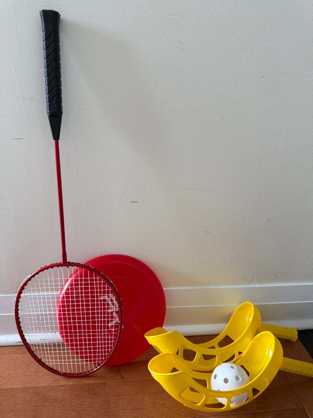 Red Badminton Racquet, Frisbee, and Yellow Ball Scoops Set