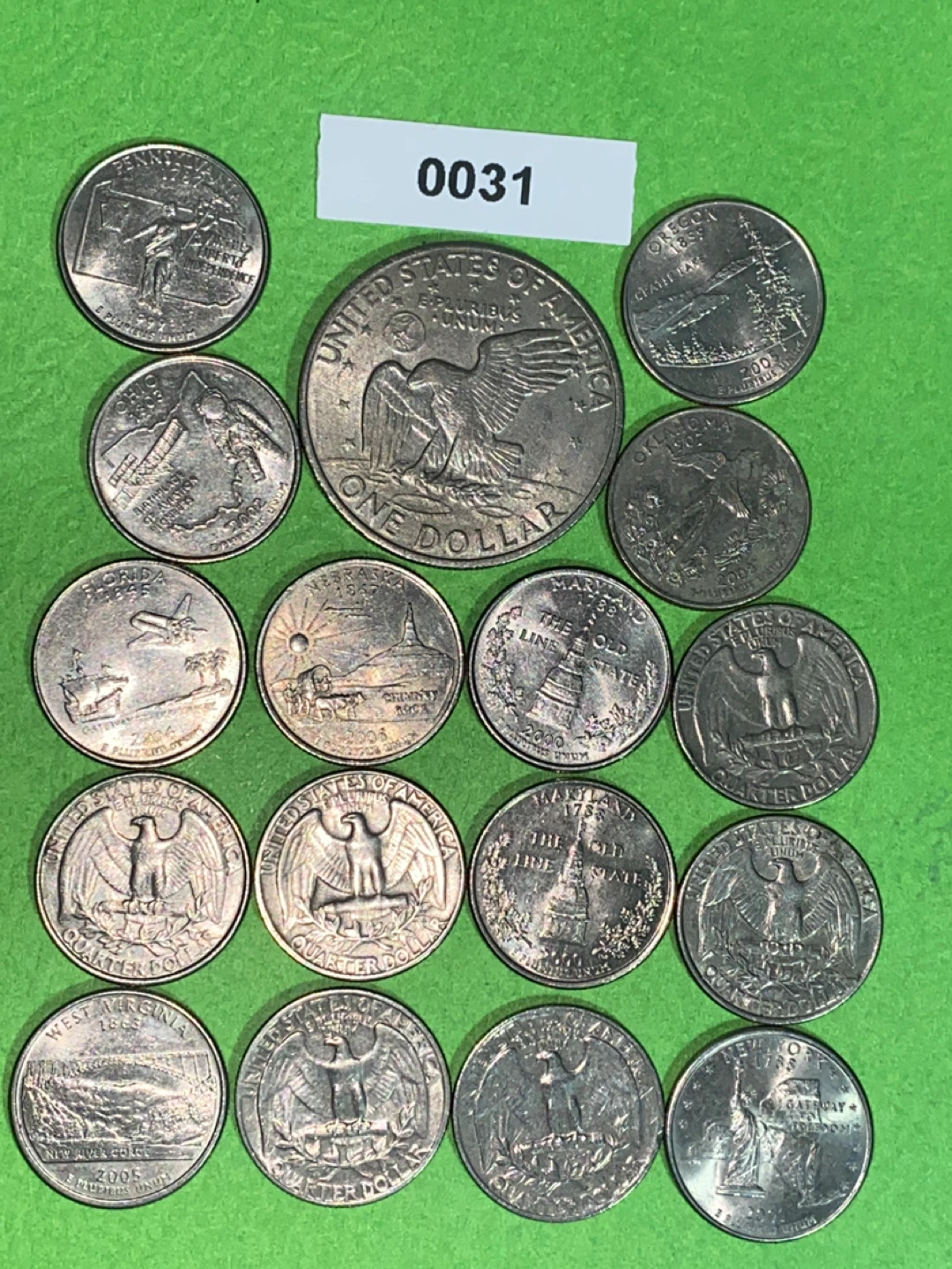 Collection of US Quarters and One Dollar Coin