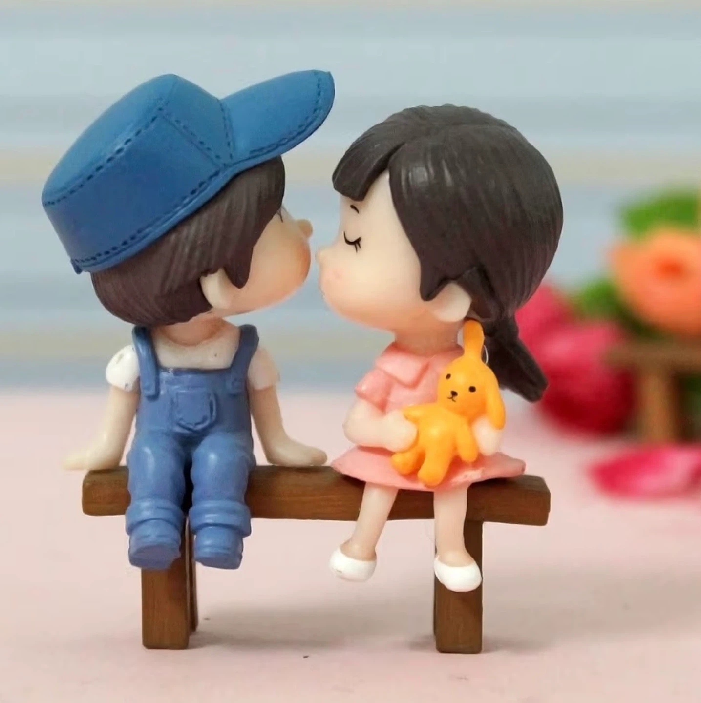 Cute Couple Figurine on Bench