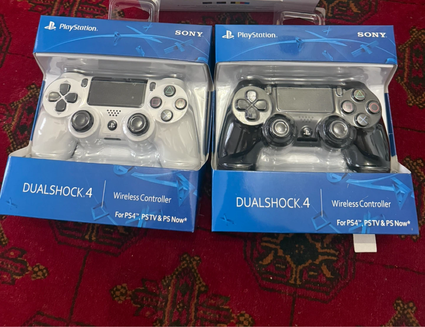 PlayStation DualShock 4 Wireless Controllers (White & Black)