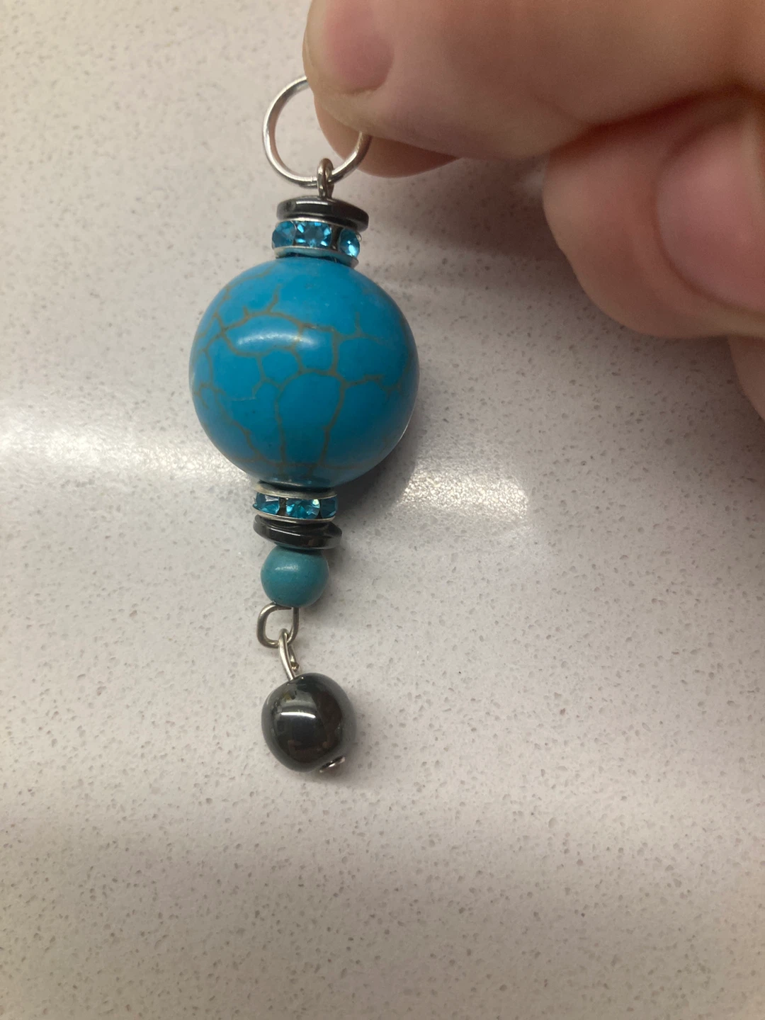 Turquoise pendant with hematite Charm