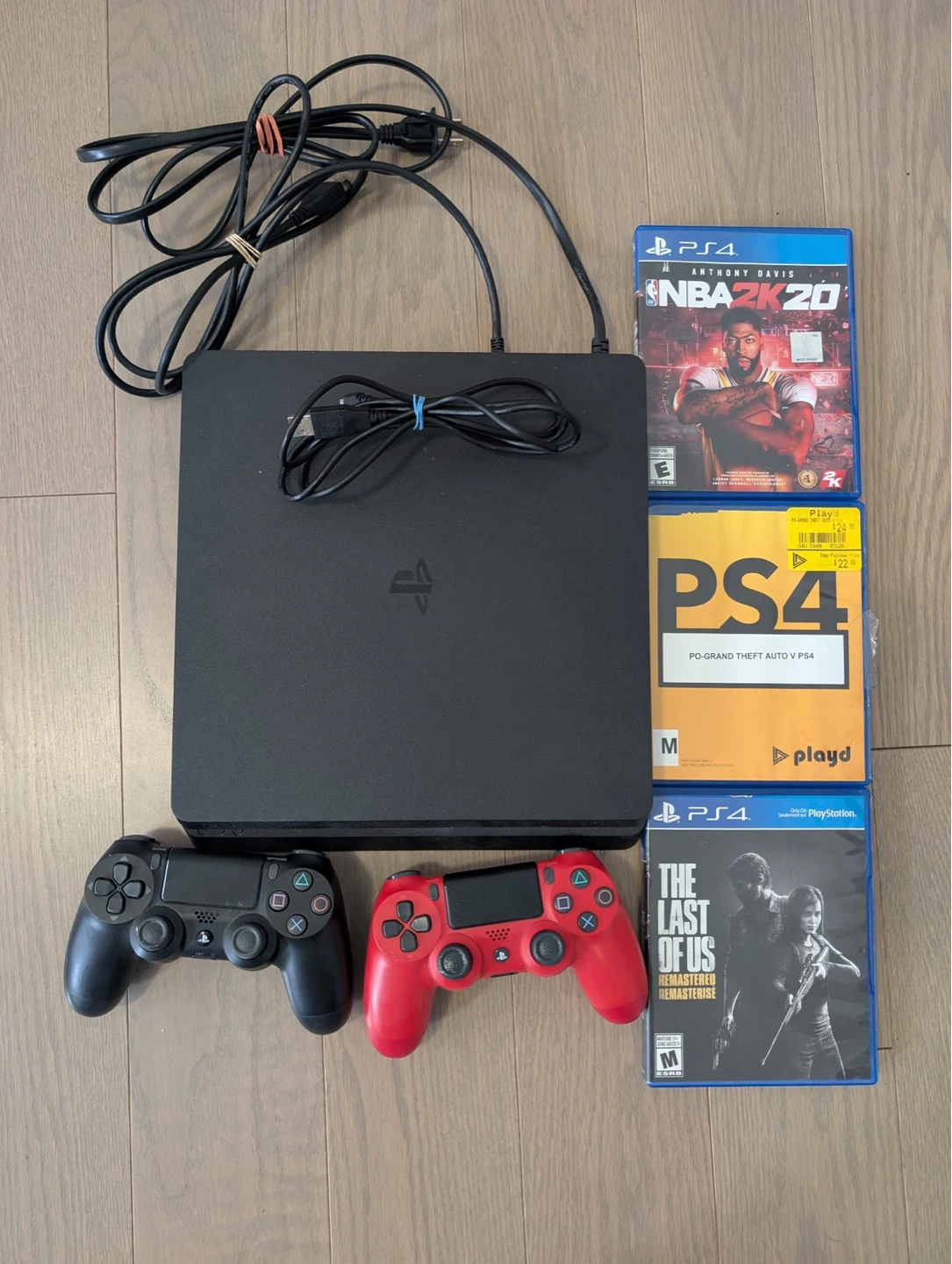 PlayStation 4 Slim Console with 2 Controllers and 3 Games