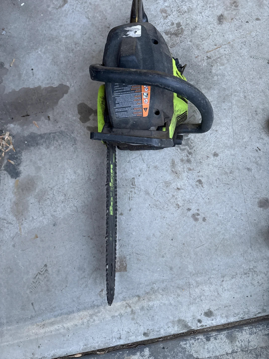 Black and Green Chainsaw