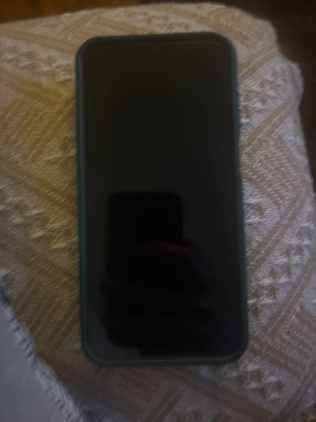 Smartphone with Teal Case (Samsung A15 5G)