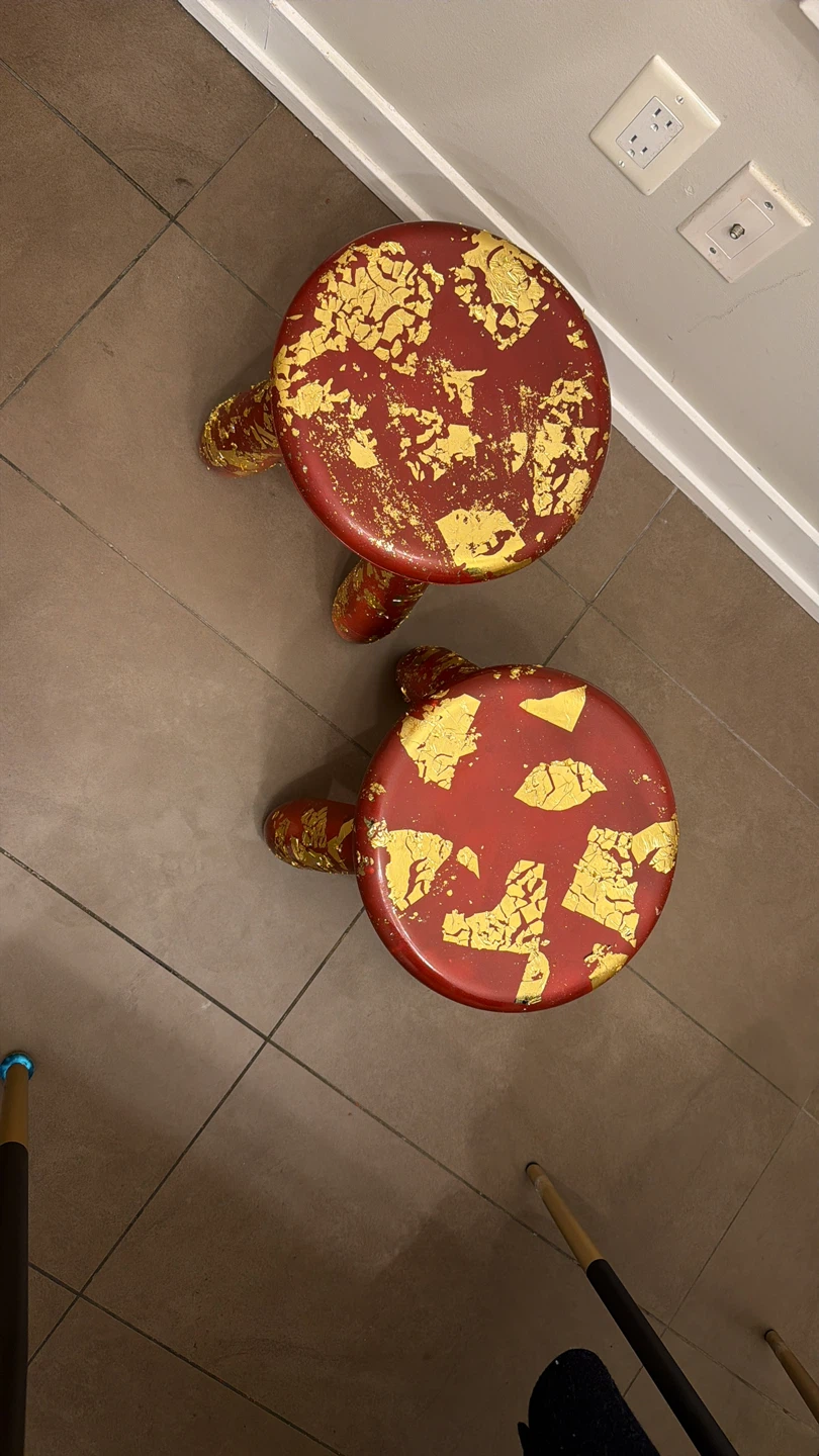 Pair of Red Turtle Stools with Gold Leaf Accents