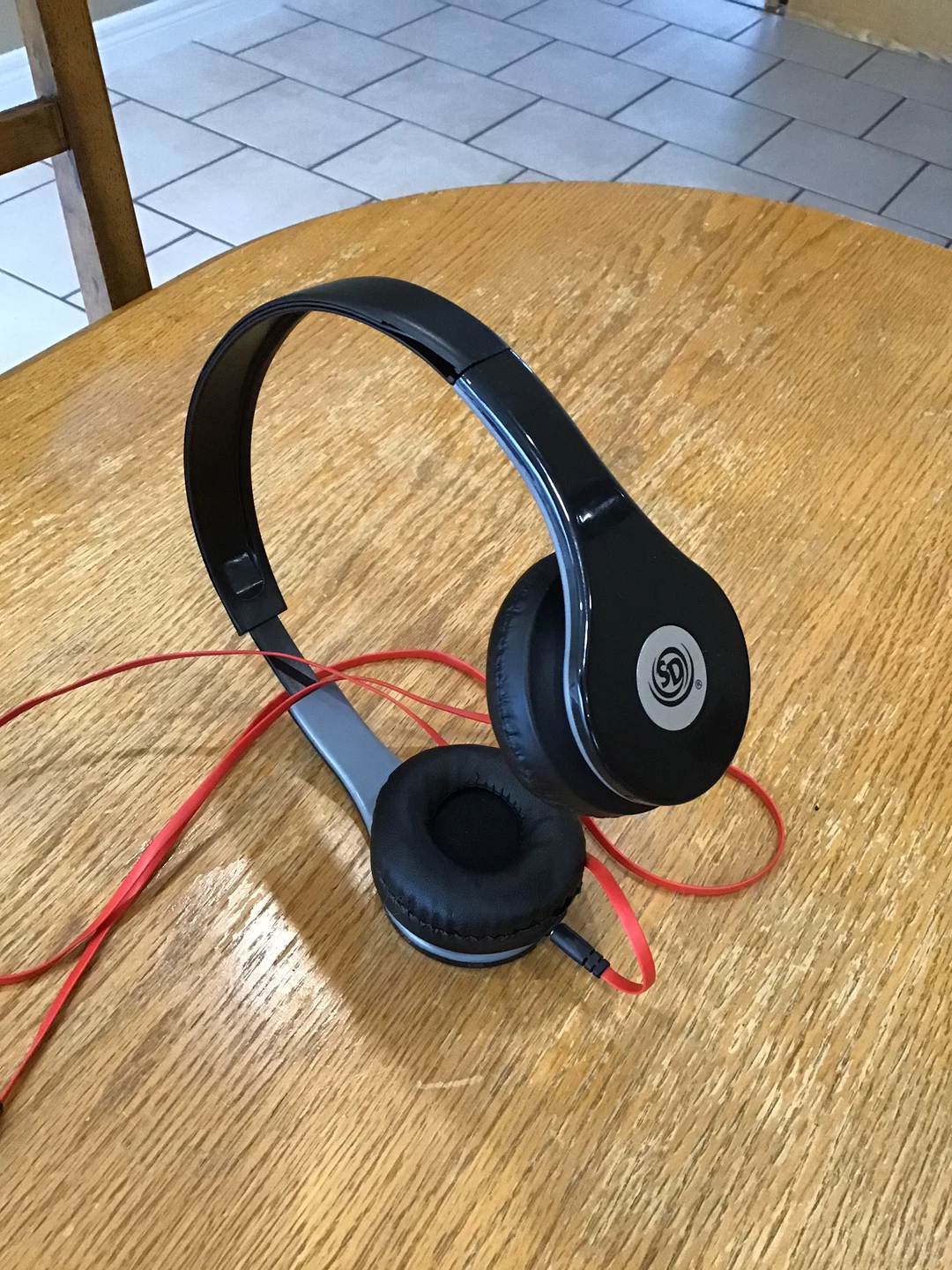 Black Over-Ear Headphones with Red Cord