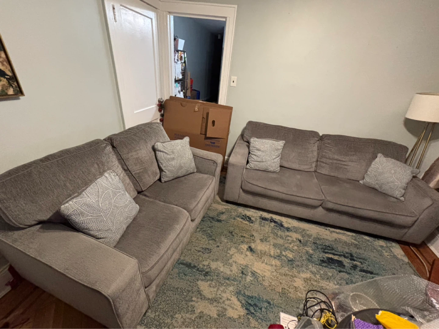 Gray Sofa and Loveseat with Accent Pillows