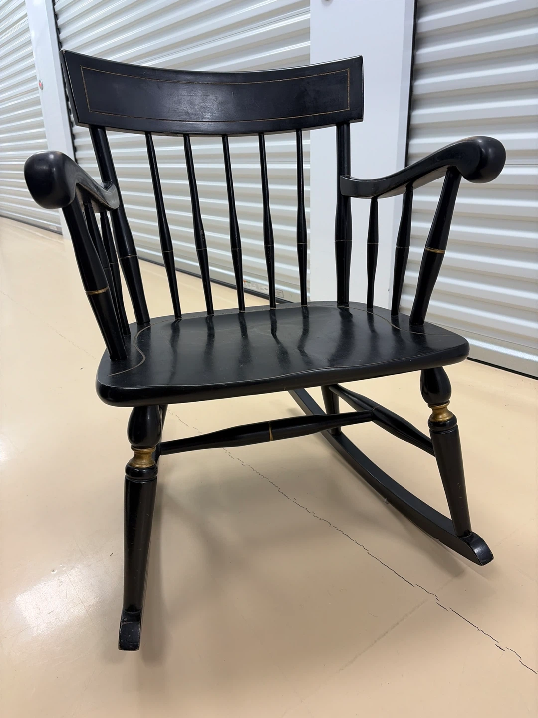 Black Rocking Chair with Gold Accents