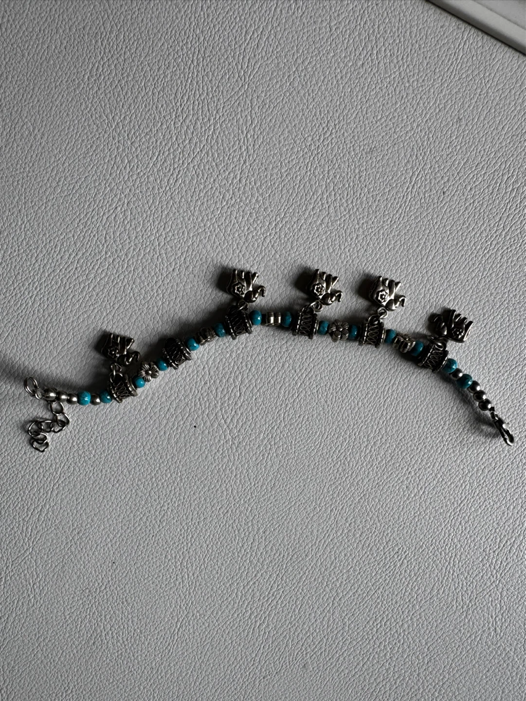 Silver anklet bracelet with turquoise beads and elephant charms