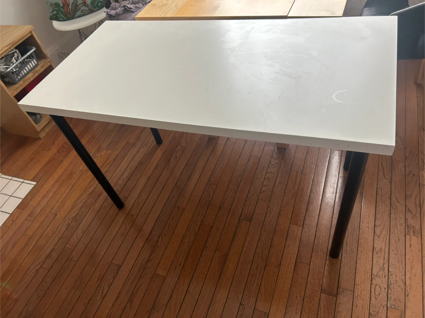 White tabletop with black legs table