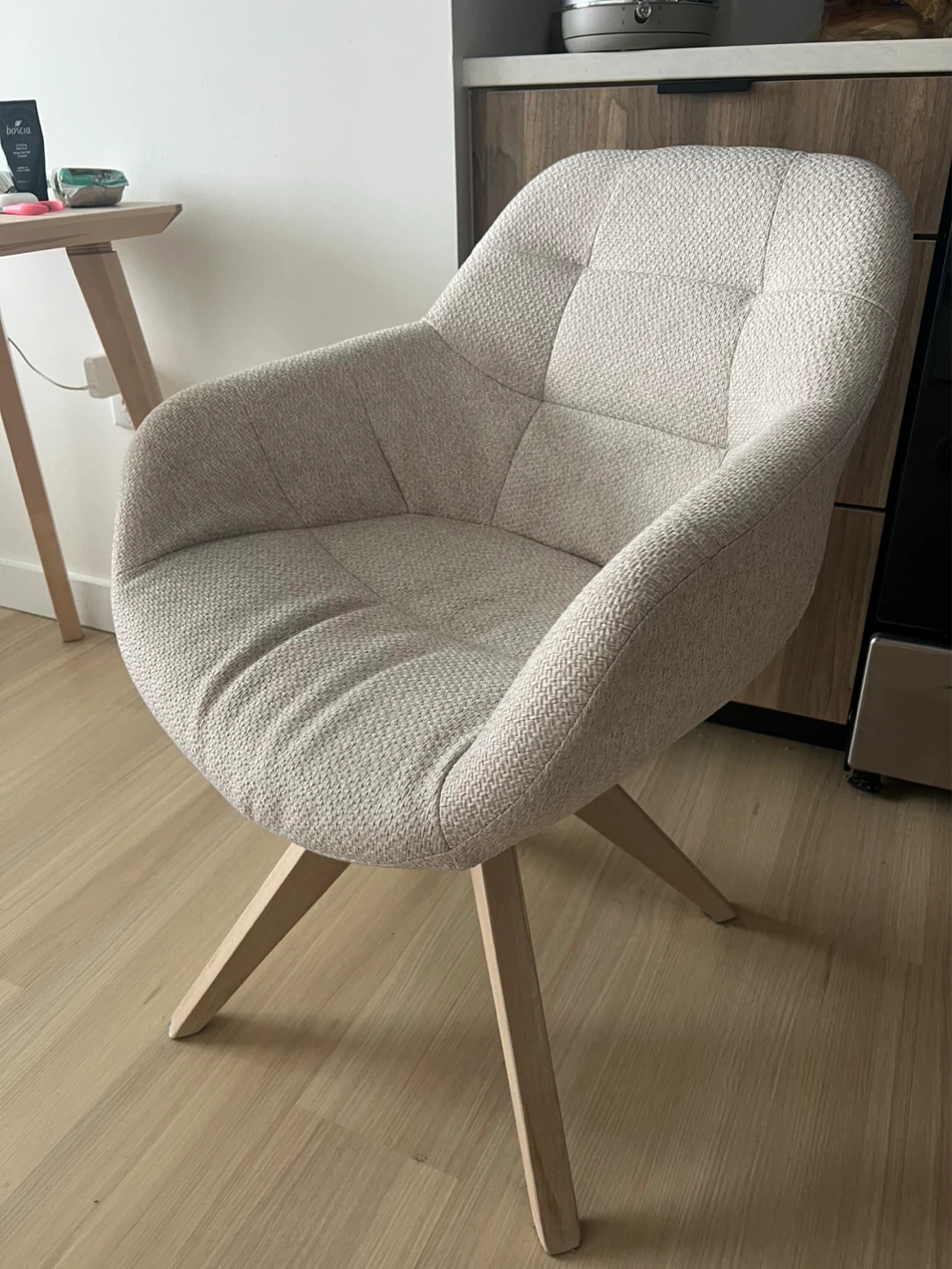 Beige Upholstered Swivel Armchair