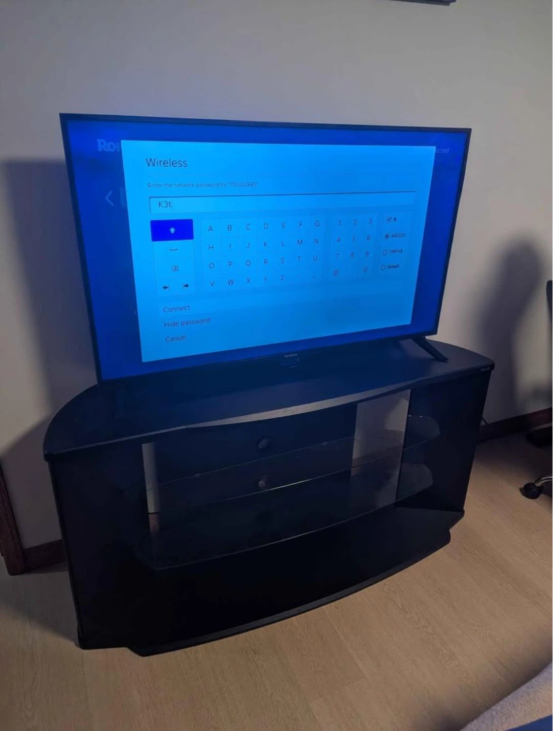 Roku TV 50 inch with TV stand in mint condition - photo 2