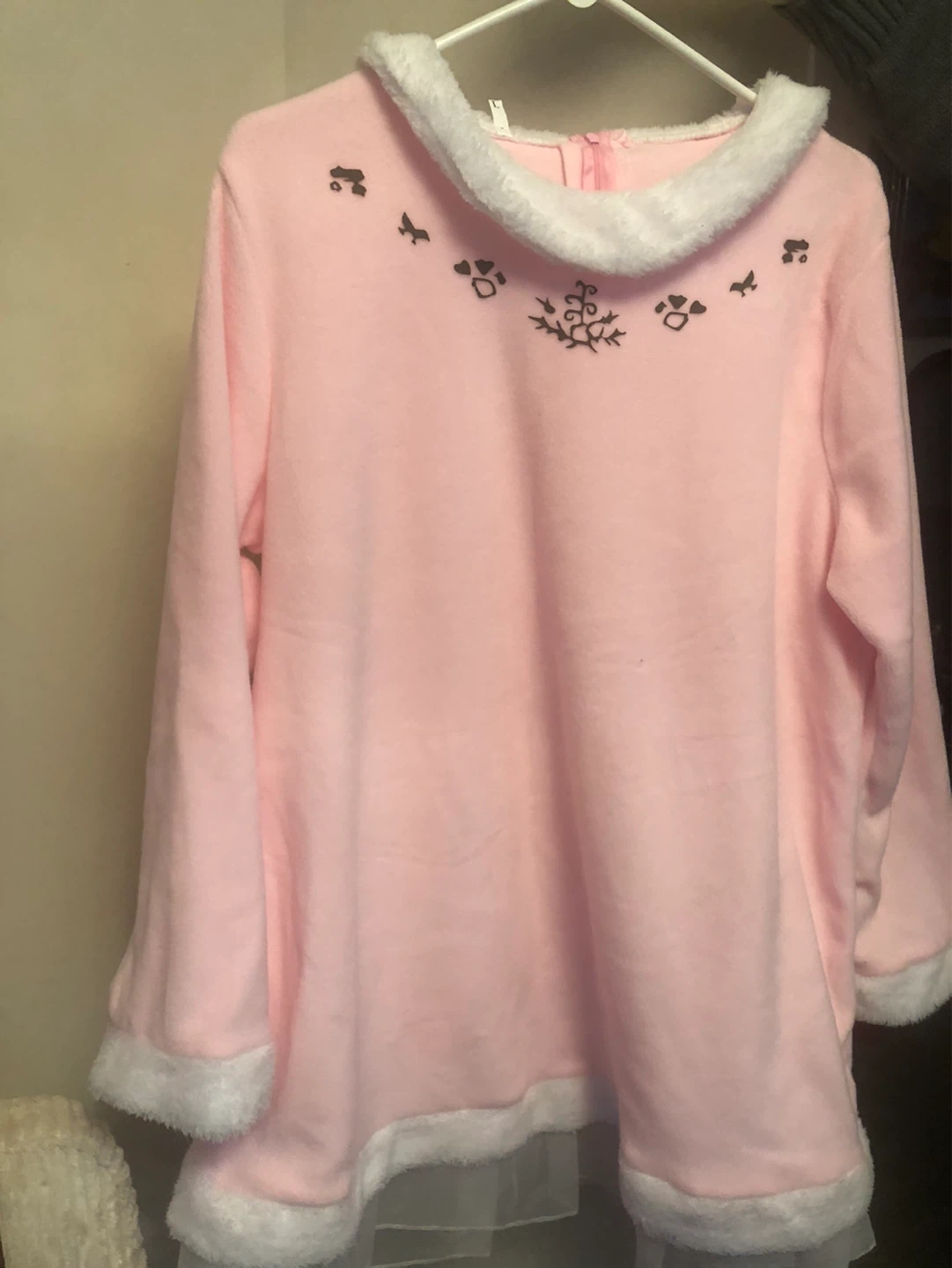 Pink fleece top with white trim
