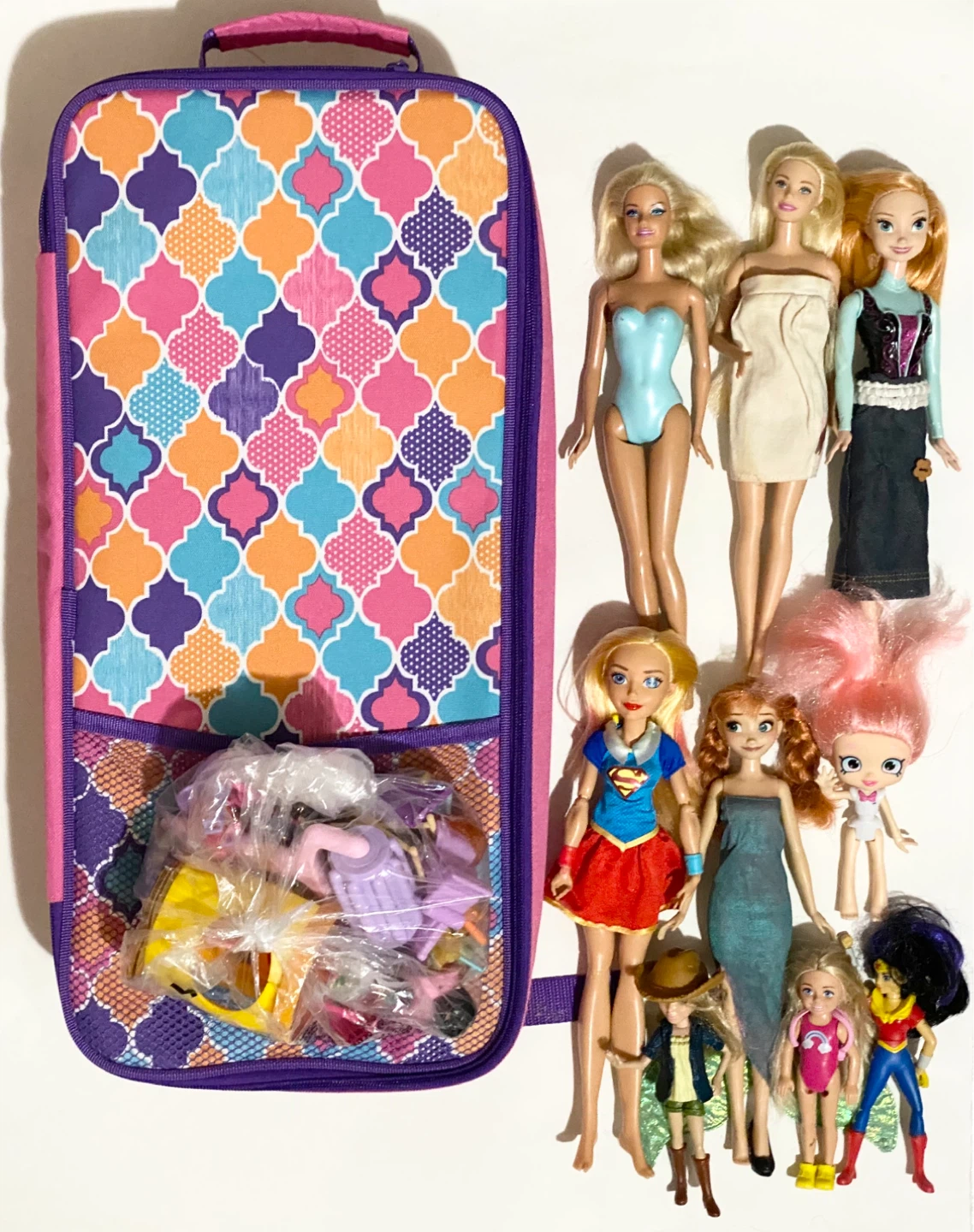 Mixed Lot of Dolls and Carrying Case