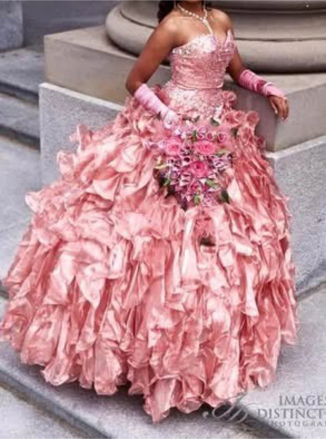 Pink Ruffled Quinceañera Dress with Embellishments
