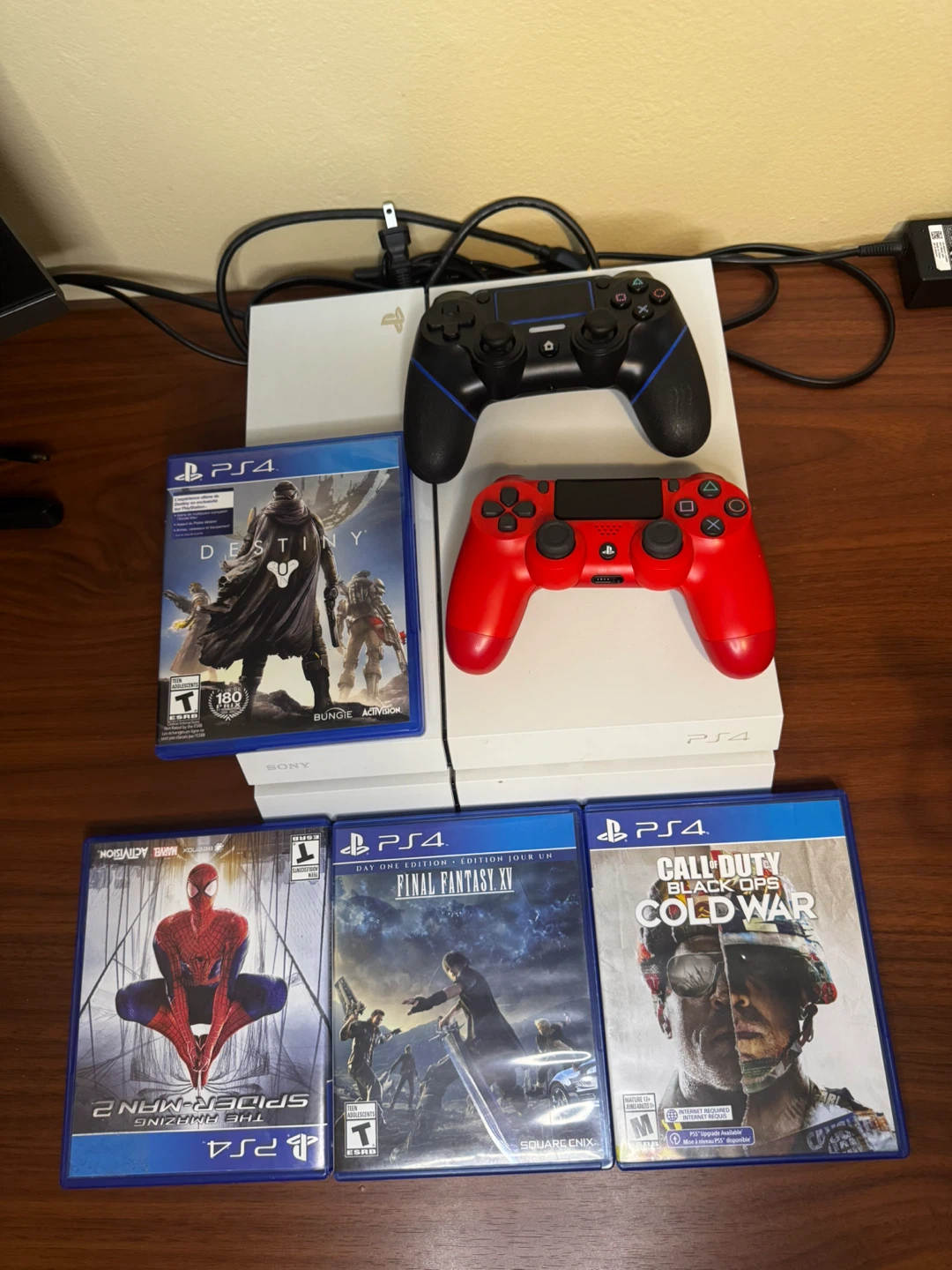 Sony PlayStation 4 Console with 4 Games