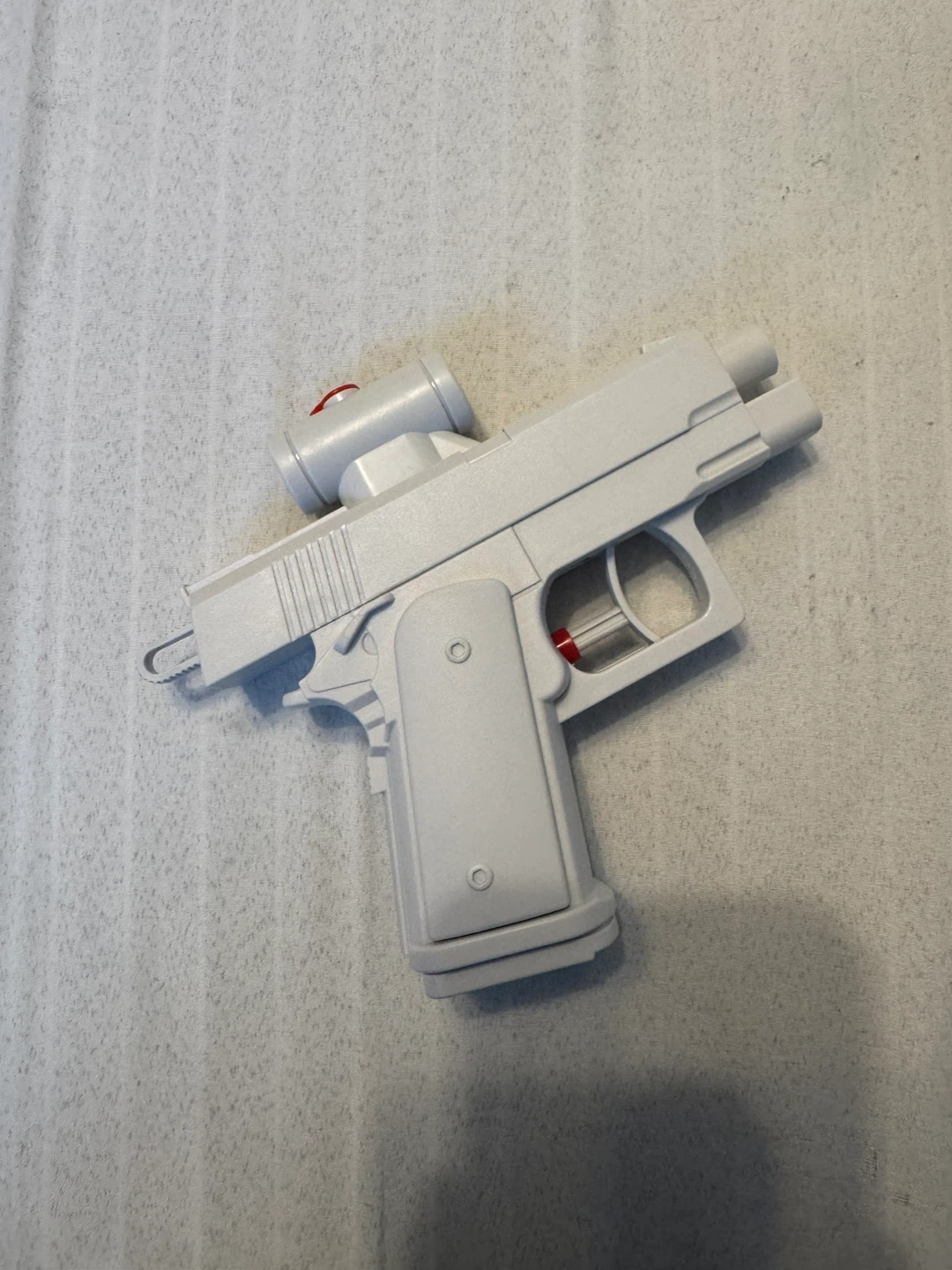 Prank Water Gun – Trick Pistol, Sprays the Shooter - photo 2
