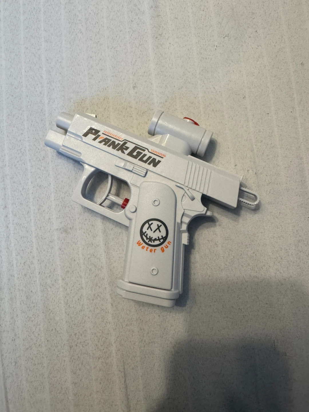 Prank Water Gun – Trick Pistol, Sprays the Shooter
