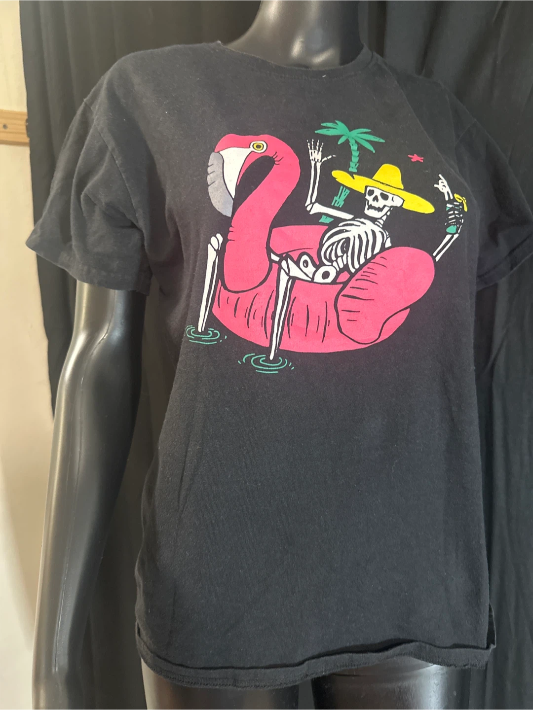 Black T-Shirt with Skeleton on Flamingo Float Graphic