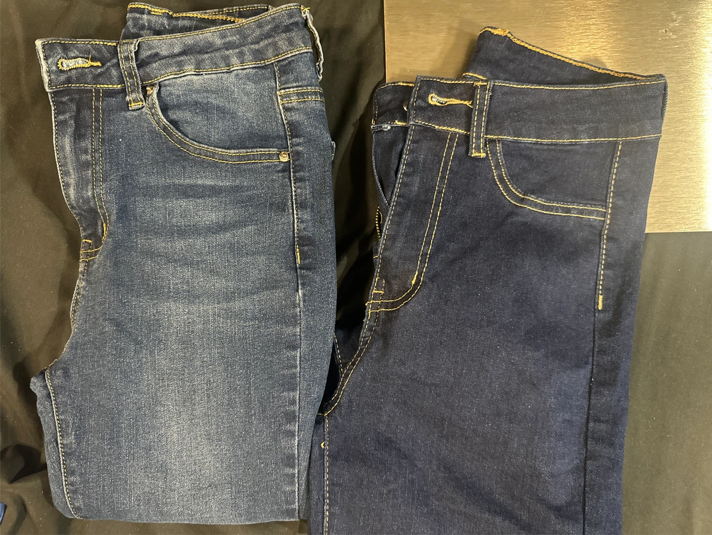 Two Pairs of Blue Denim Jeans