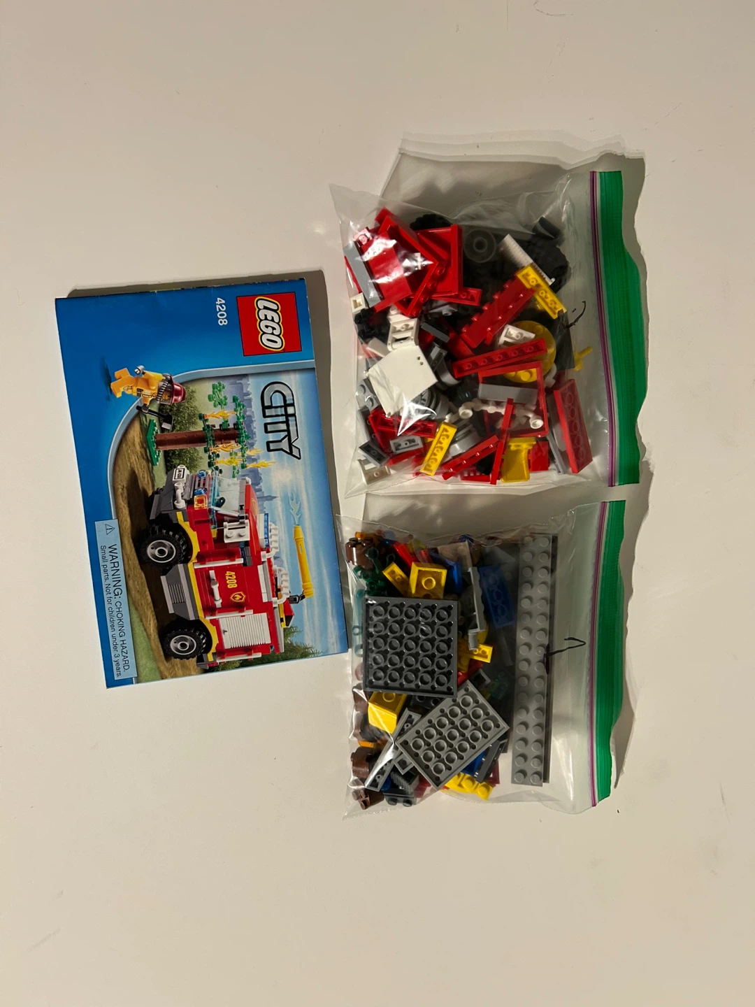 Lego City 4x4 Firetruck Set 4208 - photo 5