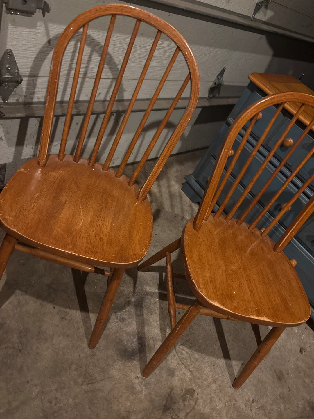 2 matching wood chairs as seen in pictures