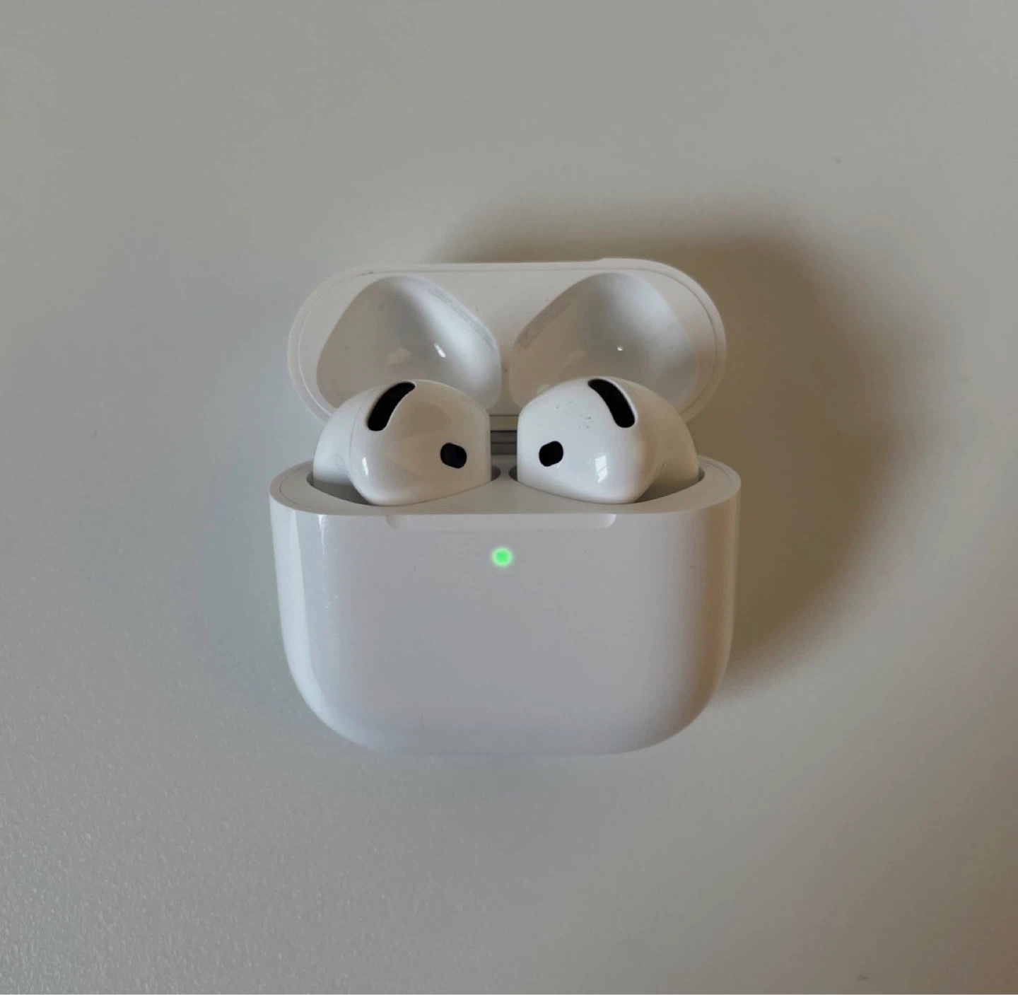 Apple AirPods 4th Generation with Charging Case - photo 2