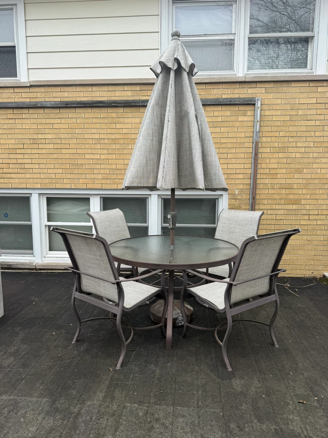 Round Glass Top Patio Dining Set with Umbrella