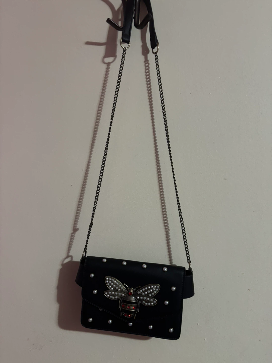 Black crossbody bag with bee embellishment - photo 3