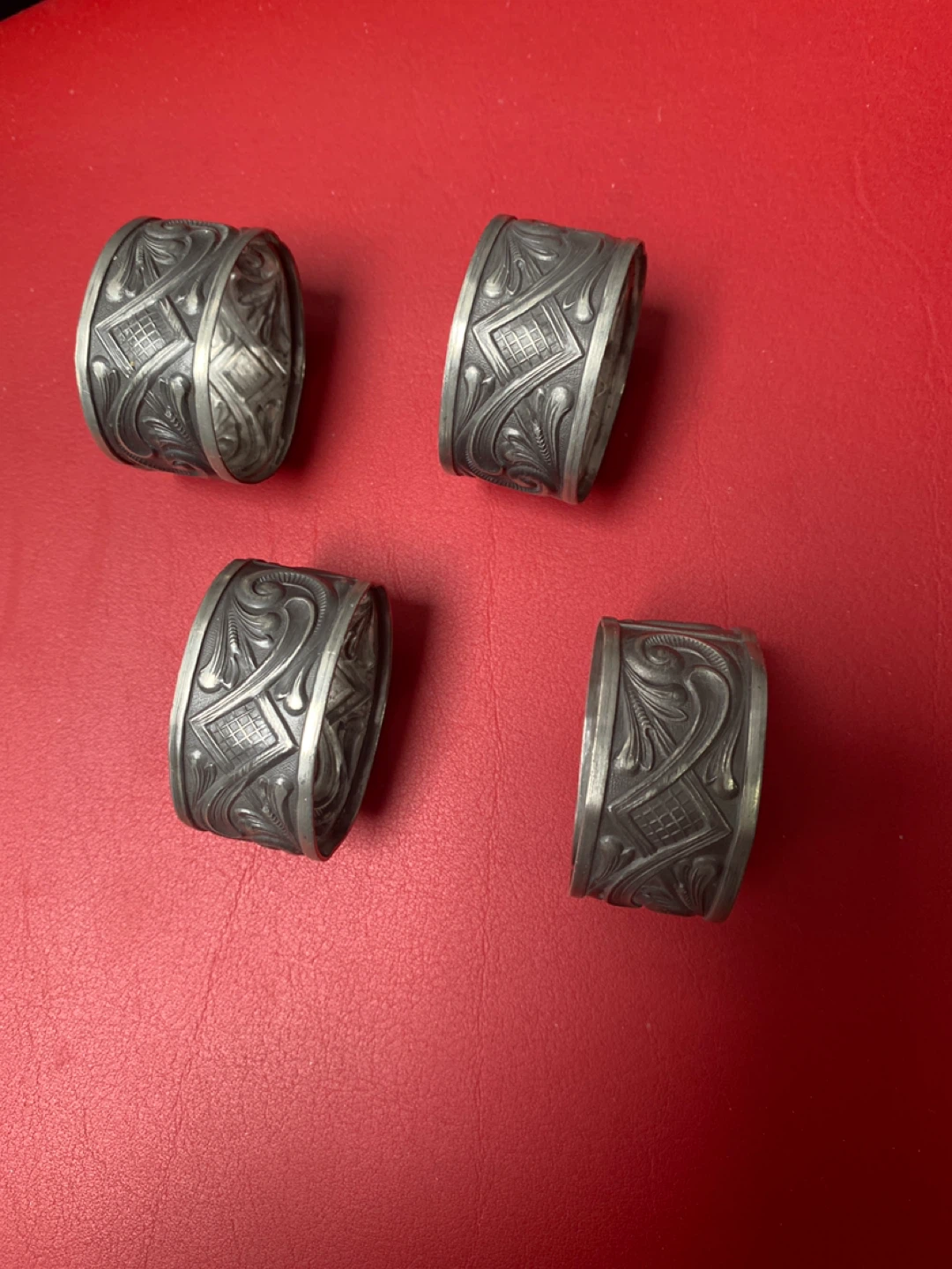 Set of 4 ornate metal napkin rings