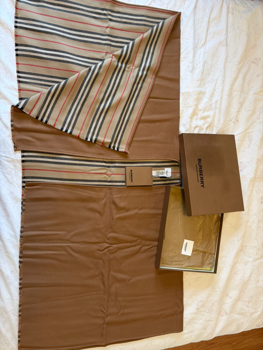 Burberry poncho with the classic check pattern