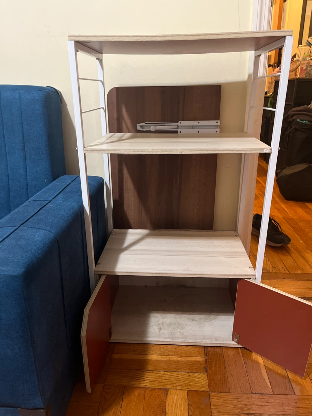 Multi-shelf storage unit with cabinet