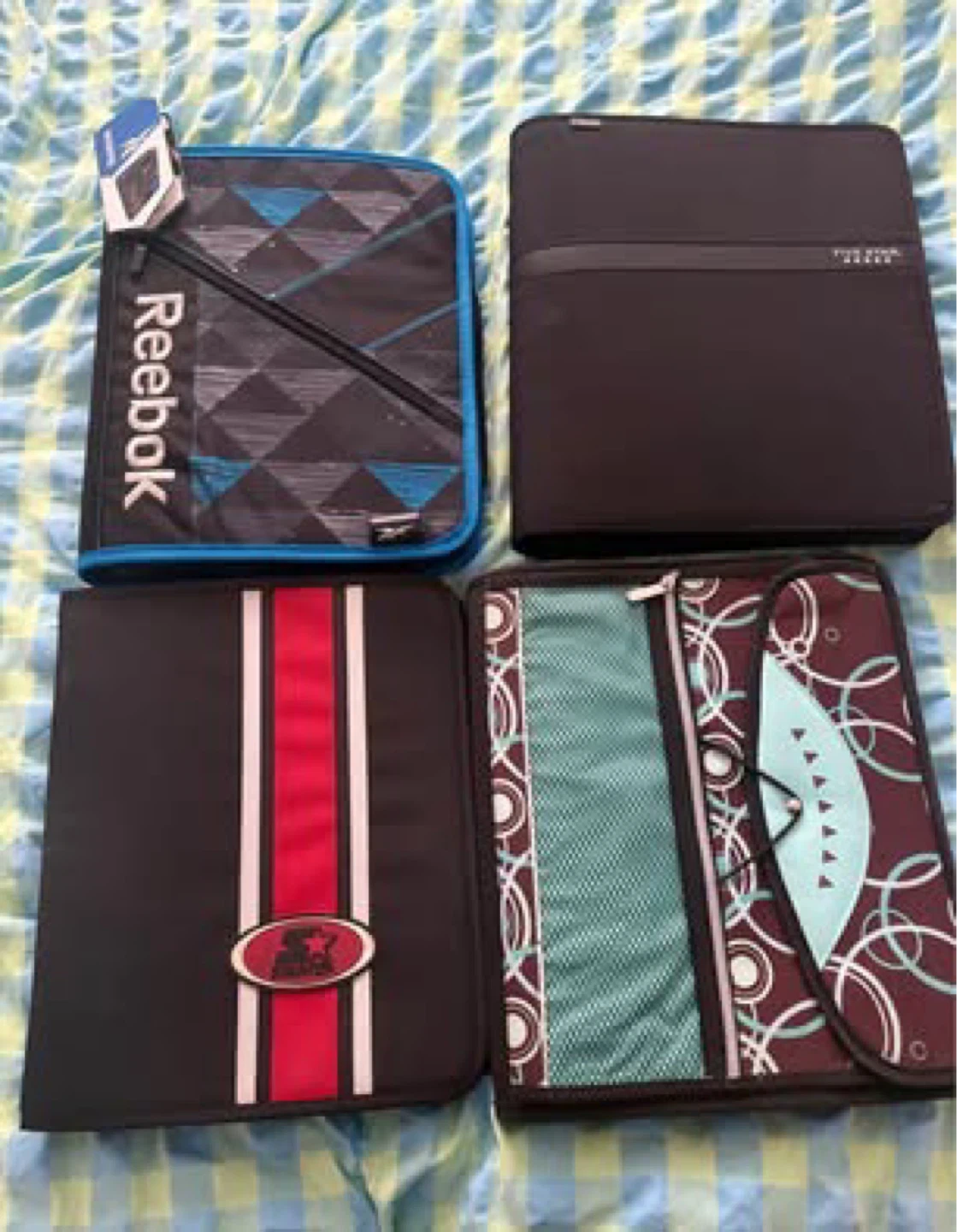 4 Zip up binders (All New) ($2 each or all together for $4)
