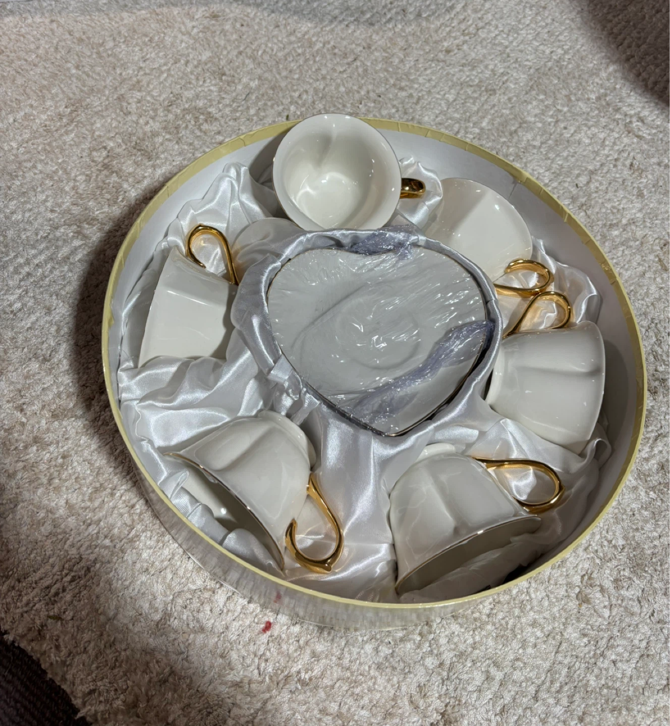White Teacup and Saucer Set with Gold Accents