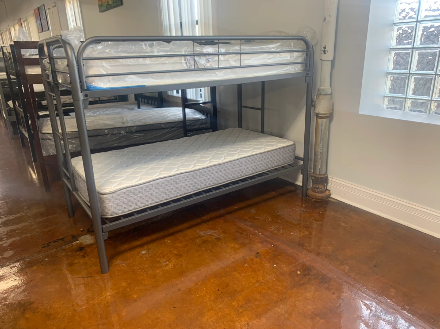 Twin Metal Bunk Bed with quality Mattresses enrollados