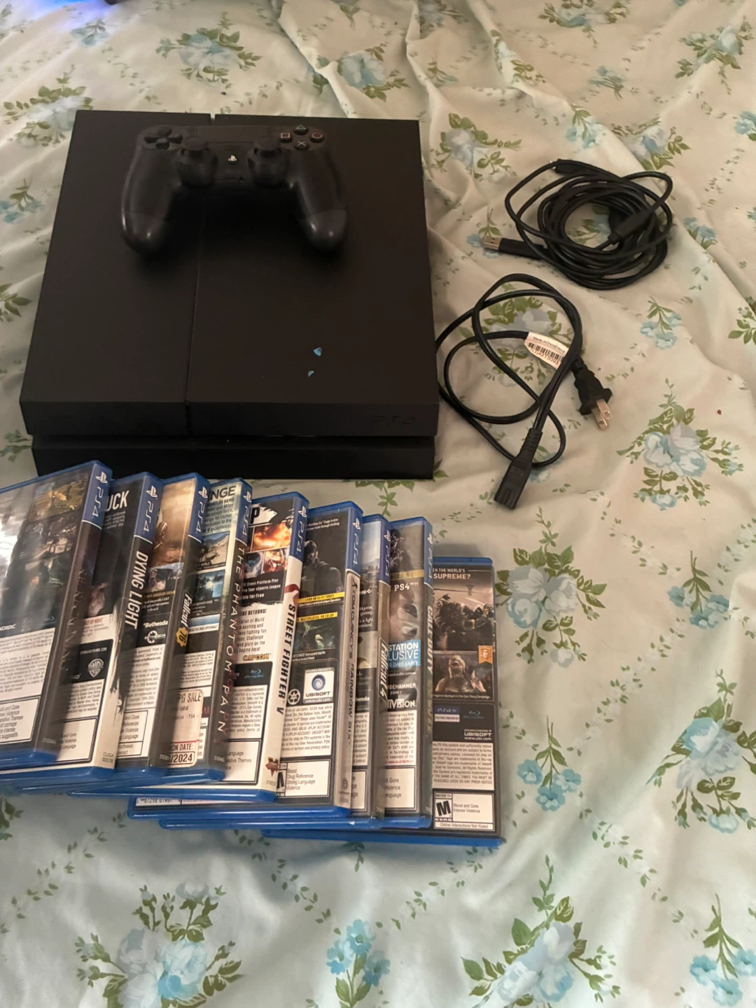 Sony PlayStation 4 Console with 9 Games
