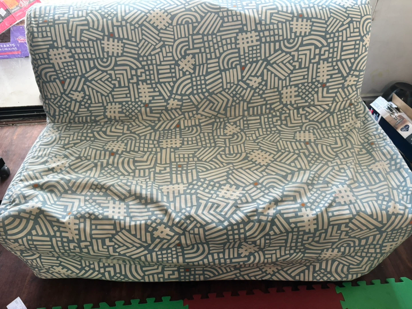 Futon Sofa Bed with Patterned Cover
