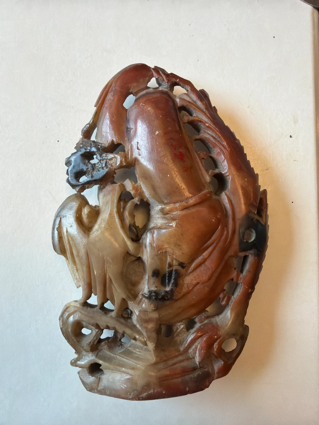 Carved Soapstone Figurine of a Person with Dragon - photo 2